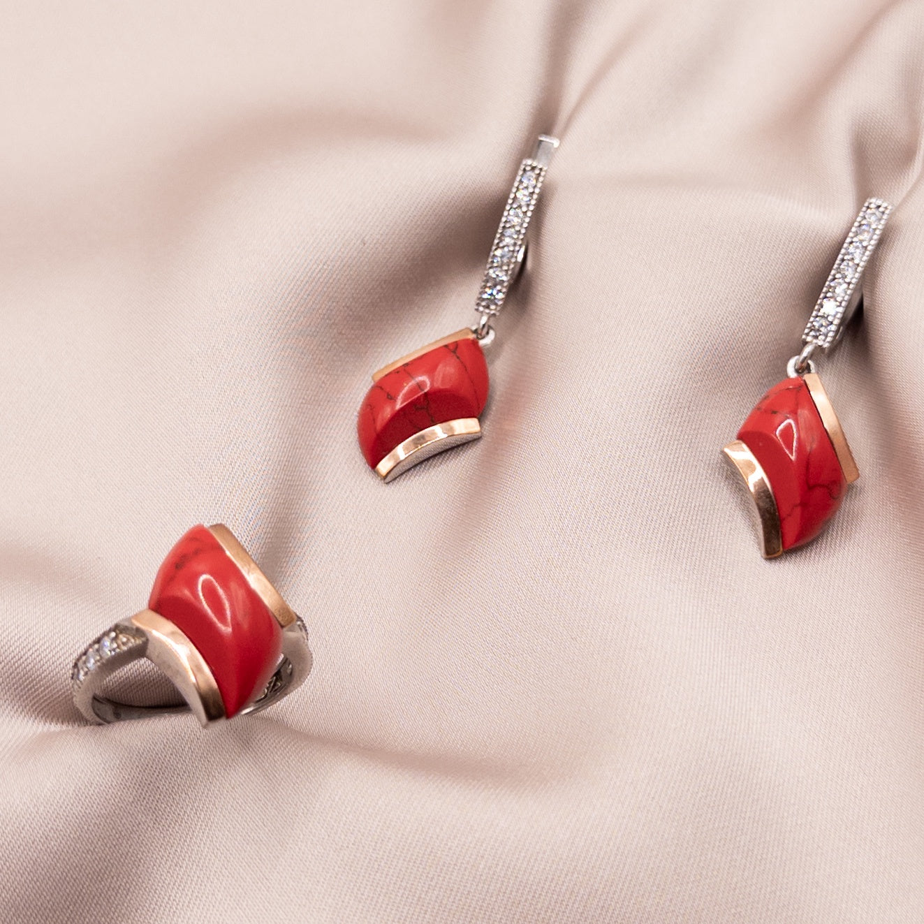 Silver set with coral and gold inserts