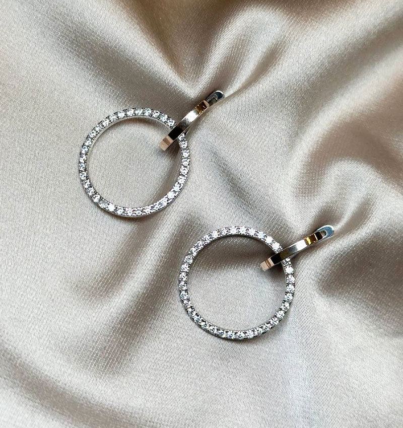 Silver earrings with gold inserts and zircon