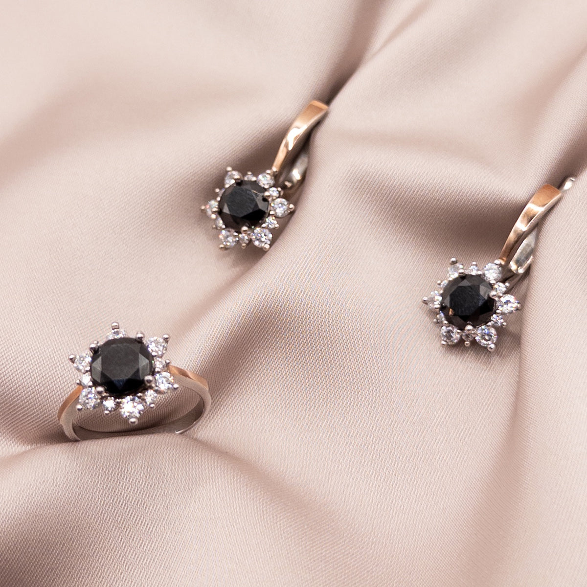 Silver set with gold accents and cubic zirconia