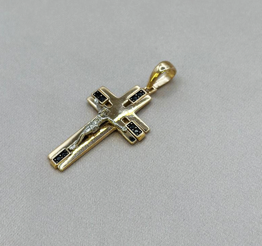 Крестик из розового золота с цирконом