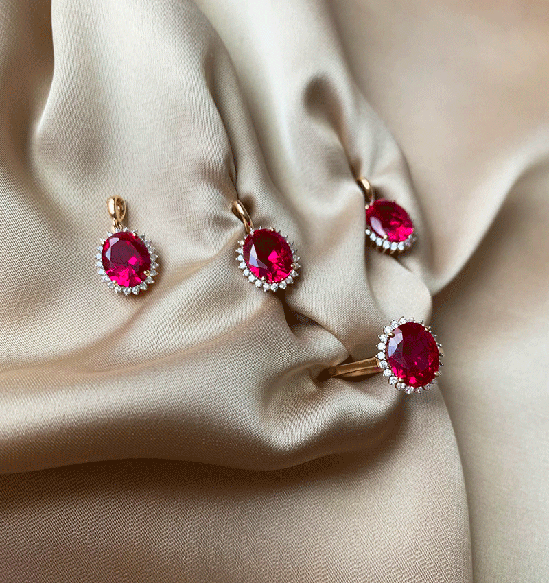 Rose gold set with zircon and synthetic ruby
