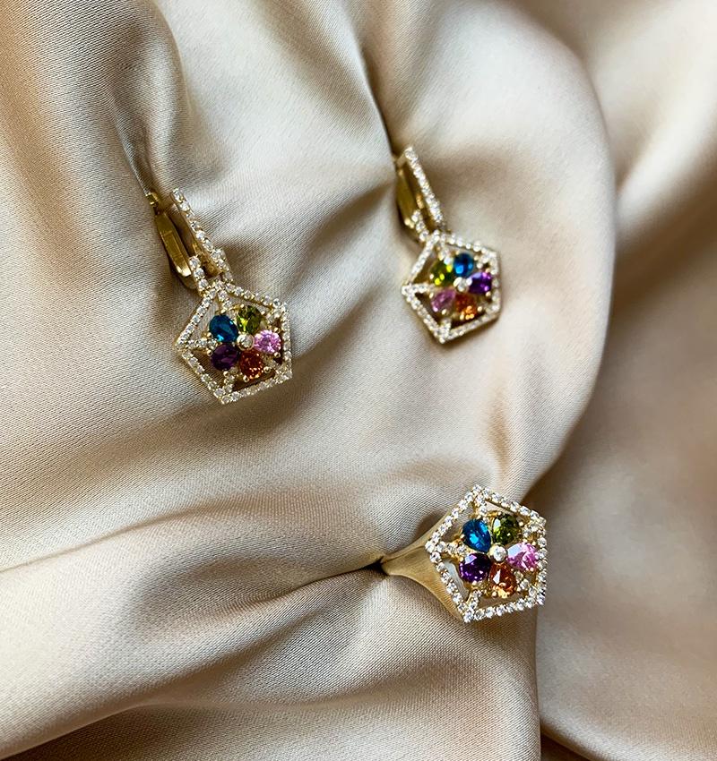 Rose gold set with amethyst, topaz, chrysolite, zircon and citrine