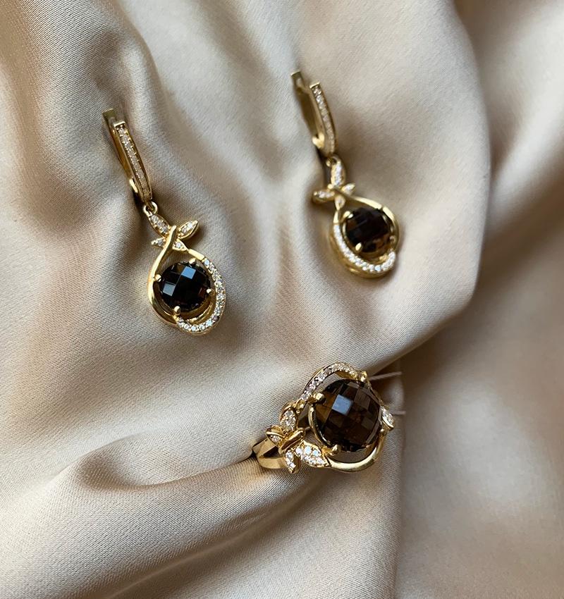 Rose gold set with zircon and smoky topaz