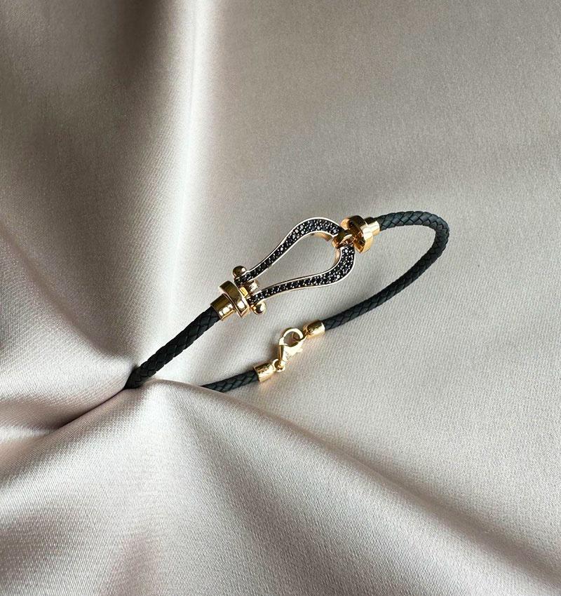 Rose gold bracelet with zircon, leather and rubber