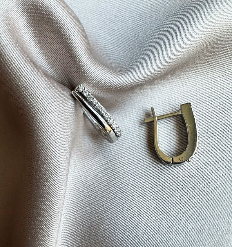 White gold earrings with a 0.16ct diamond