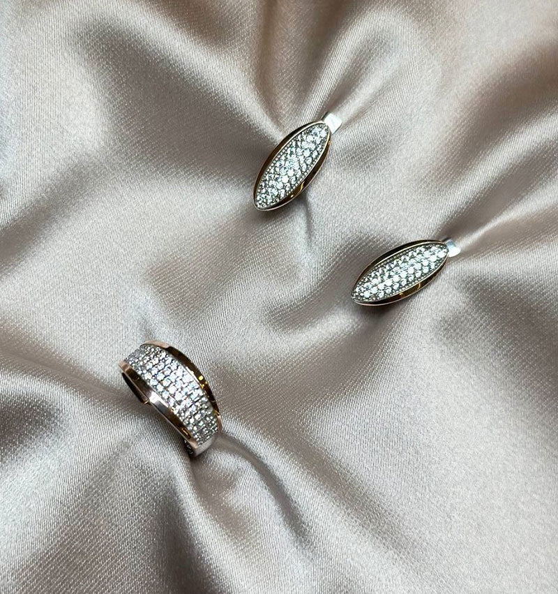 Set of silver with gold inserts and zircon