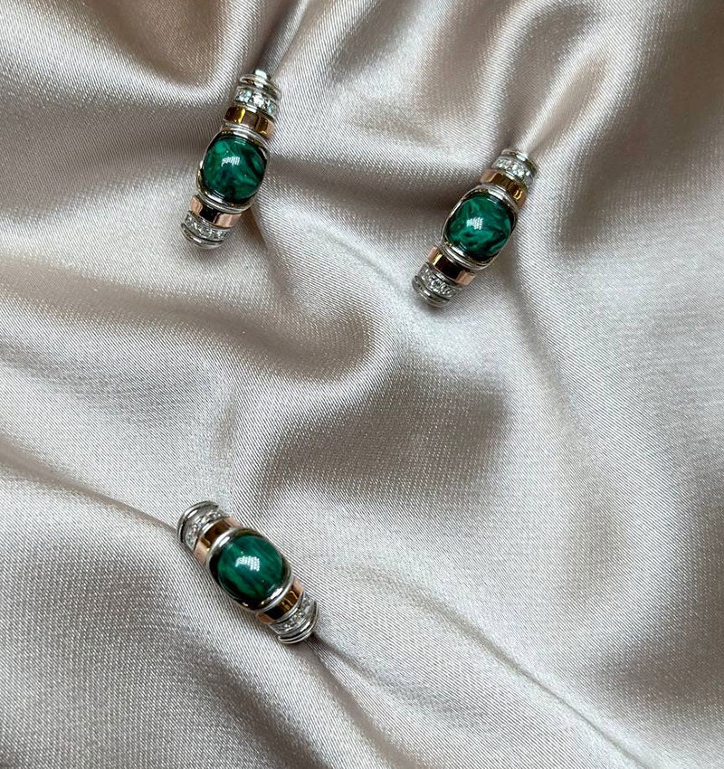 A set of silver with gold inserts, malachite and zircon