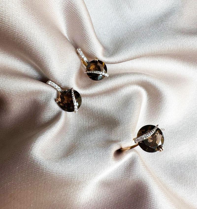 Rose gold set with zircon and smoky topaz