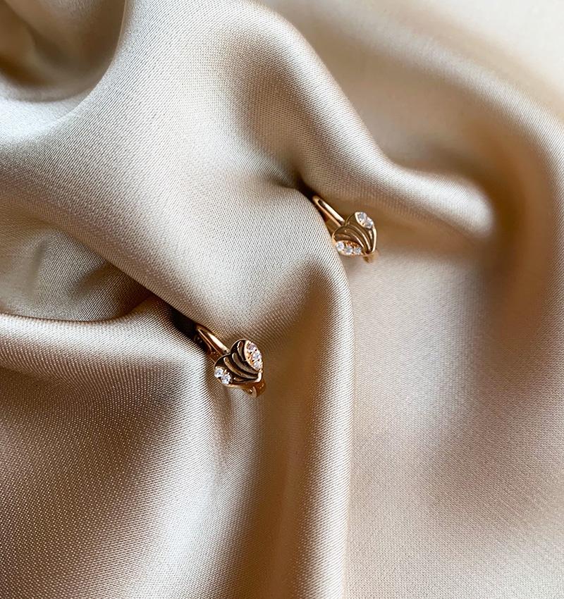 Rose gold earrings with zircon