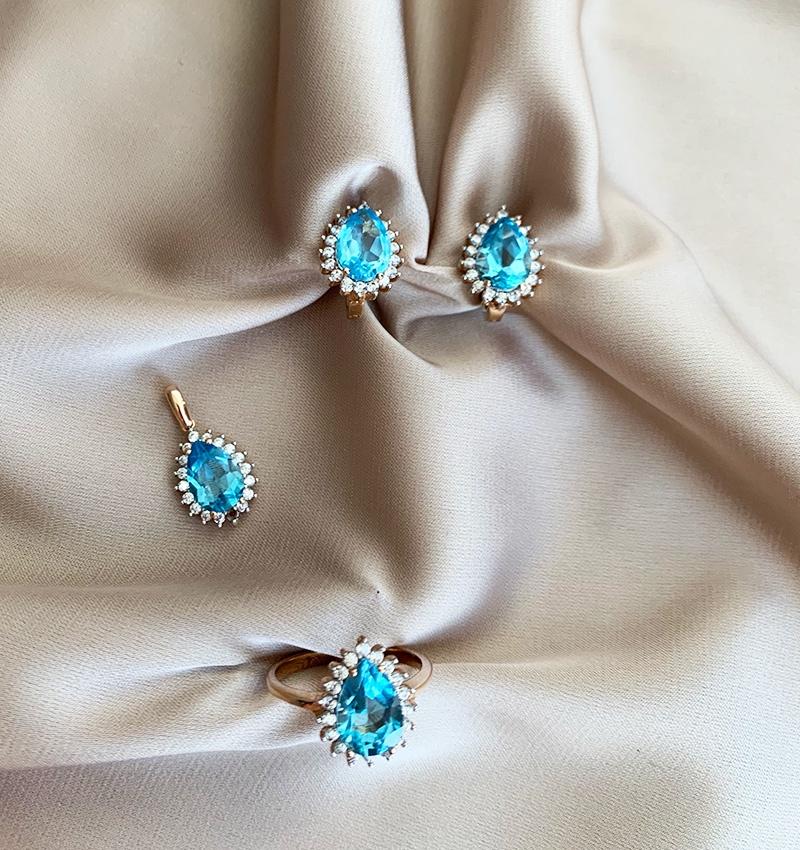 Rose gold set with zircon and topaz