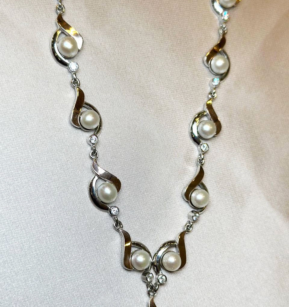 Silver necklace with gold inserts, zircon and pearls