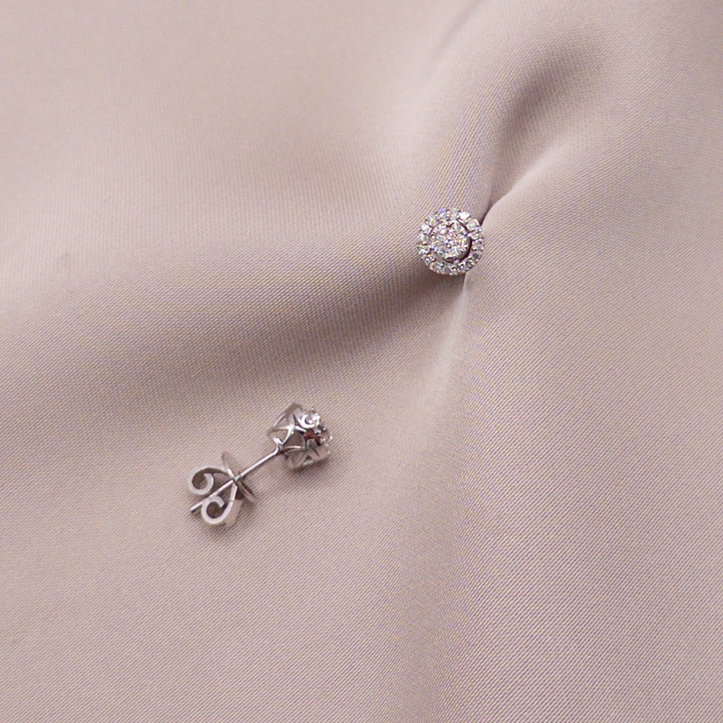 Серьги из белого золота с бриллиантом 0.25ct