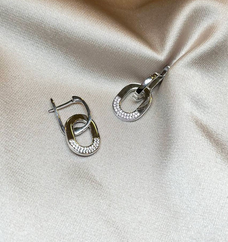 Silver earrings with zircon