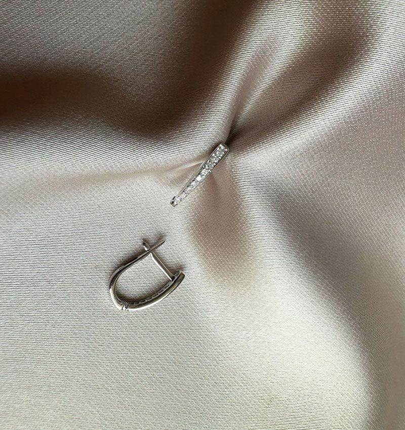 Серьги из белого золота с бриллиантом 0.11ct