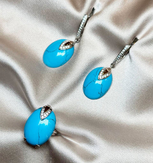 A set of silver with gold inserts, turquoise and zircon