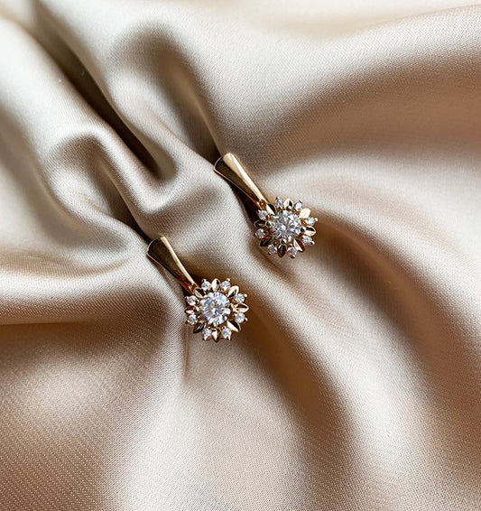 Rose gold earrings with zircon