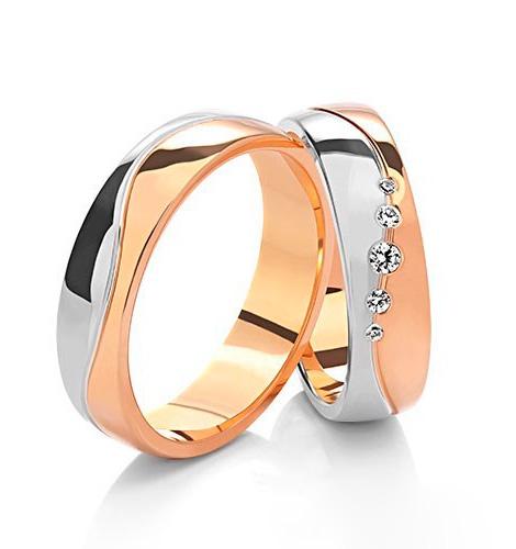 Wedding rings in white, rose, and yellow gold with cubic zirconia