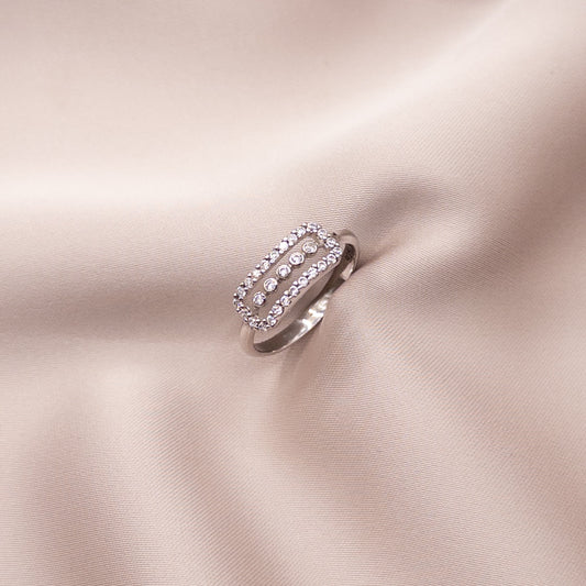 Silver ring with a zircon