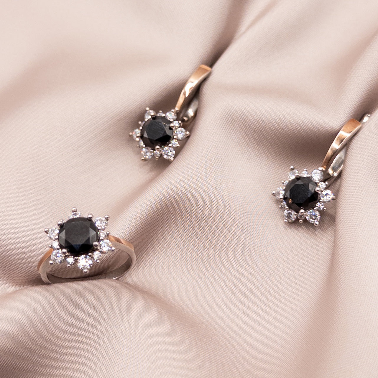 Silver set with gold accents and cubic zirconia