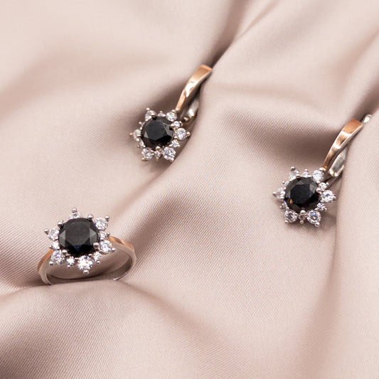 Silver set with gold accents and cubic zirconia
