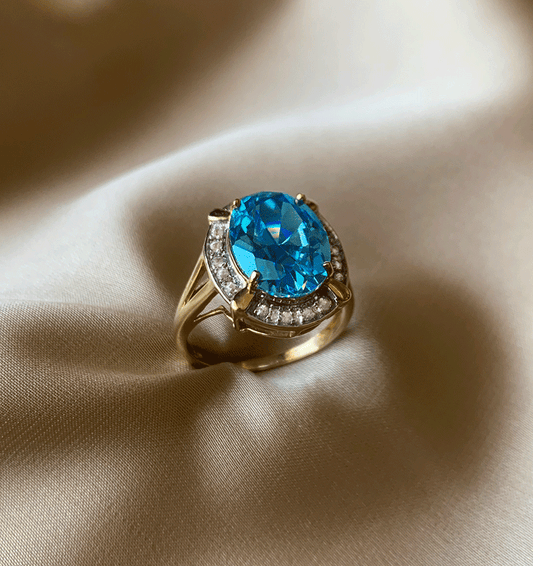 Yellow gold ring with zircon and topaz