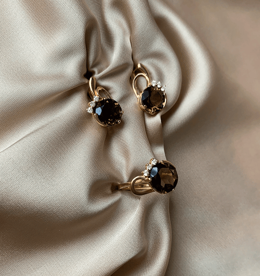 Rose gold set with zircon and smoky topaz