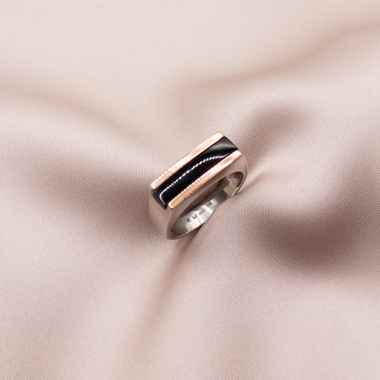 Silver ring with gold inserts and onyx