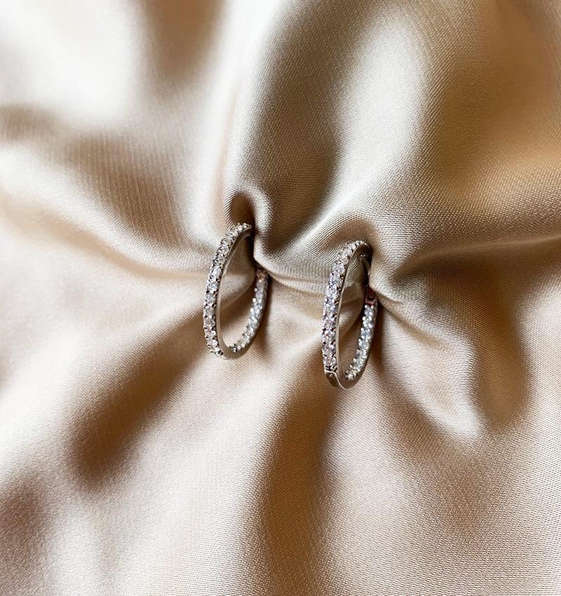 White gold earrings with zircon