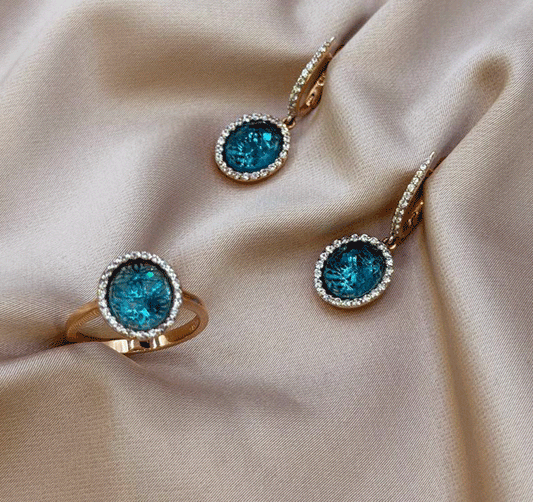 Сет из розового золота с цирконом