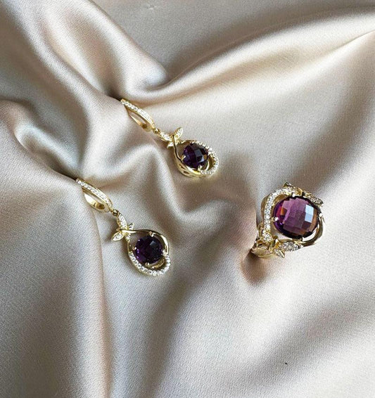 Yellow gold set with zircon and amethyst