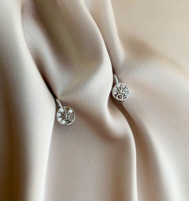 White gold earrings with zircon
