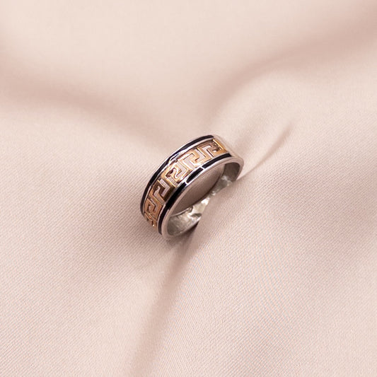 Silver ring with gold inserts and onyx