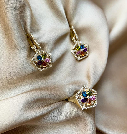 Rose gold set with amethyst, topaz, chrysolite, zircon and citrine