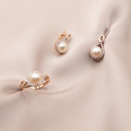 Rose gold set with zircon and pearls