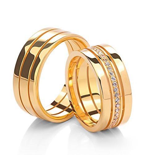Wedding rings in white, rose, and yellow gold with cubic zirconia