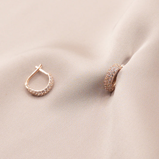 Rose gold earrings with zircon