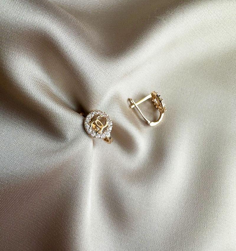 Rose gold earrings with zircon