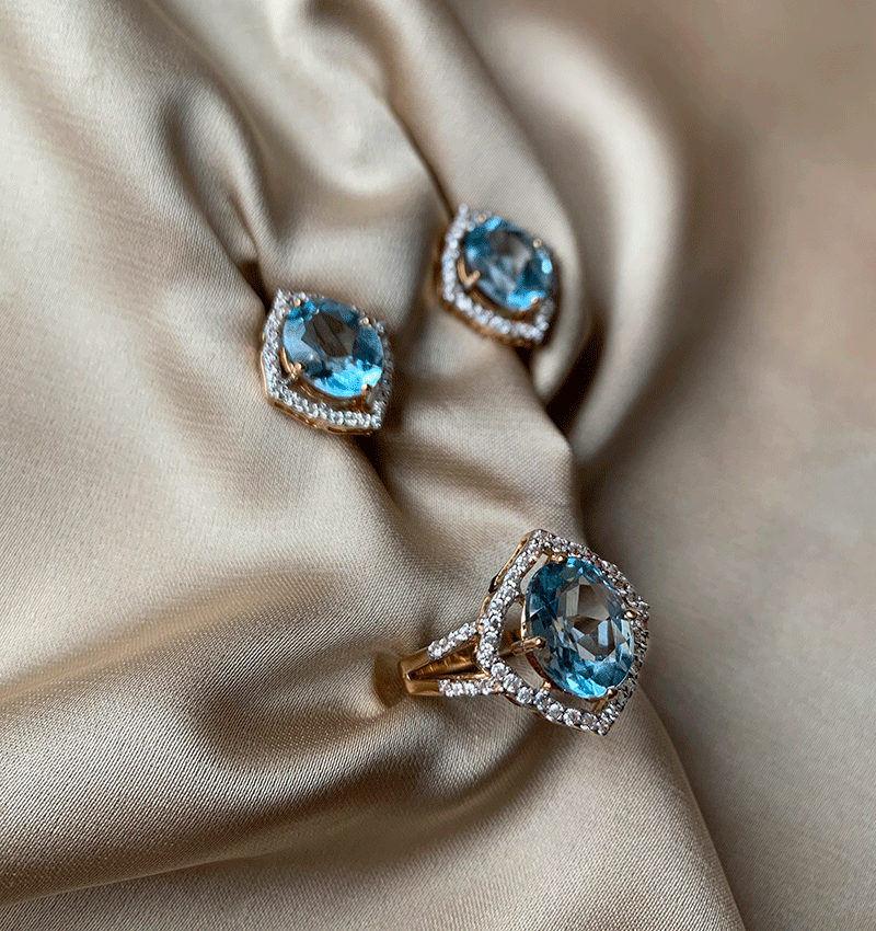 Rose gold set with zircon and topaz