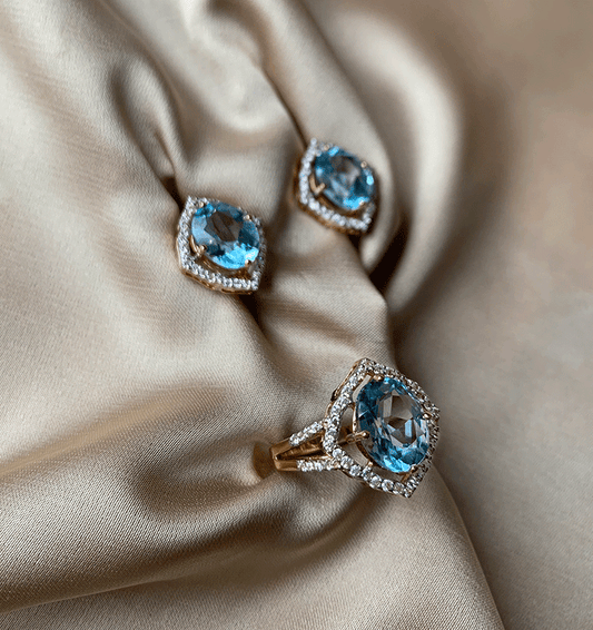 Rose gold set with zircon and topaz