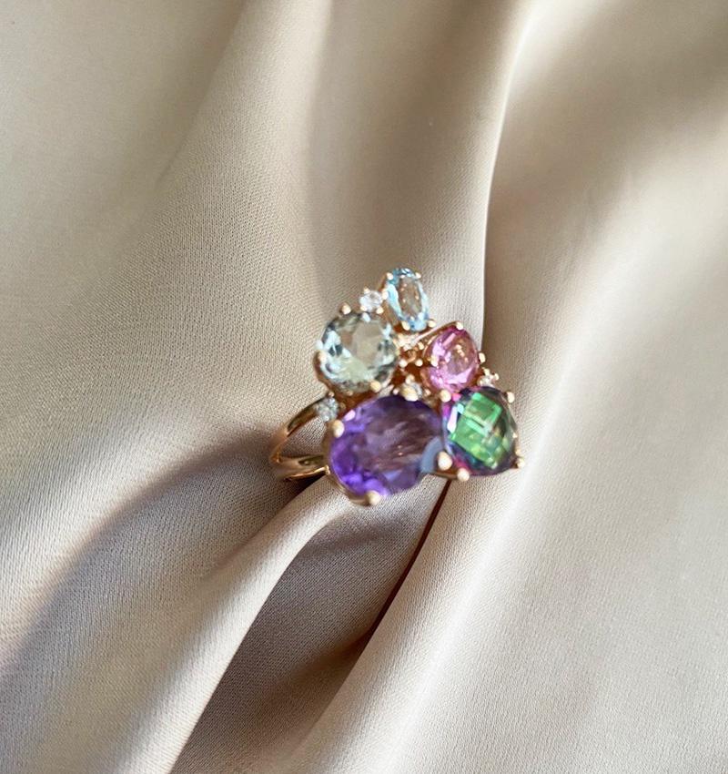 Rose gold ring with topaz and amethyst