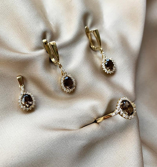 Rose gold set with zircon and smoky topaz