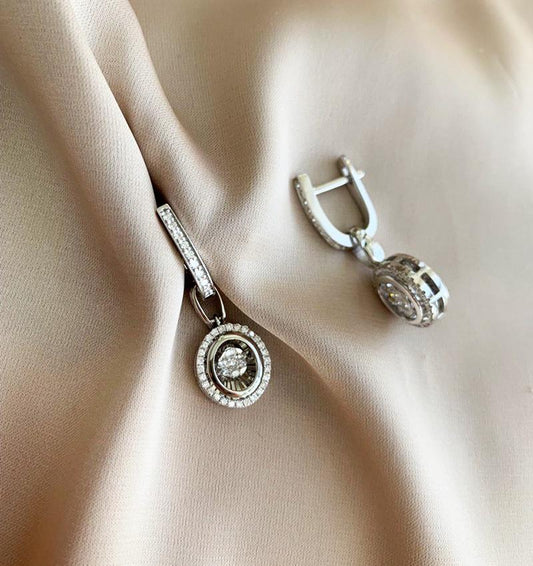 White gold earrings with a 0.67K diamond