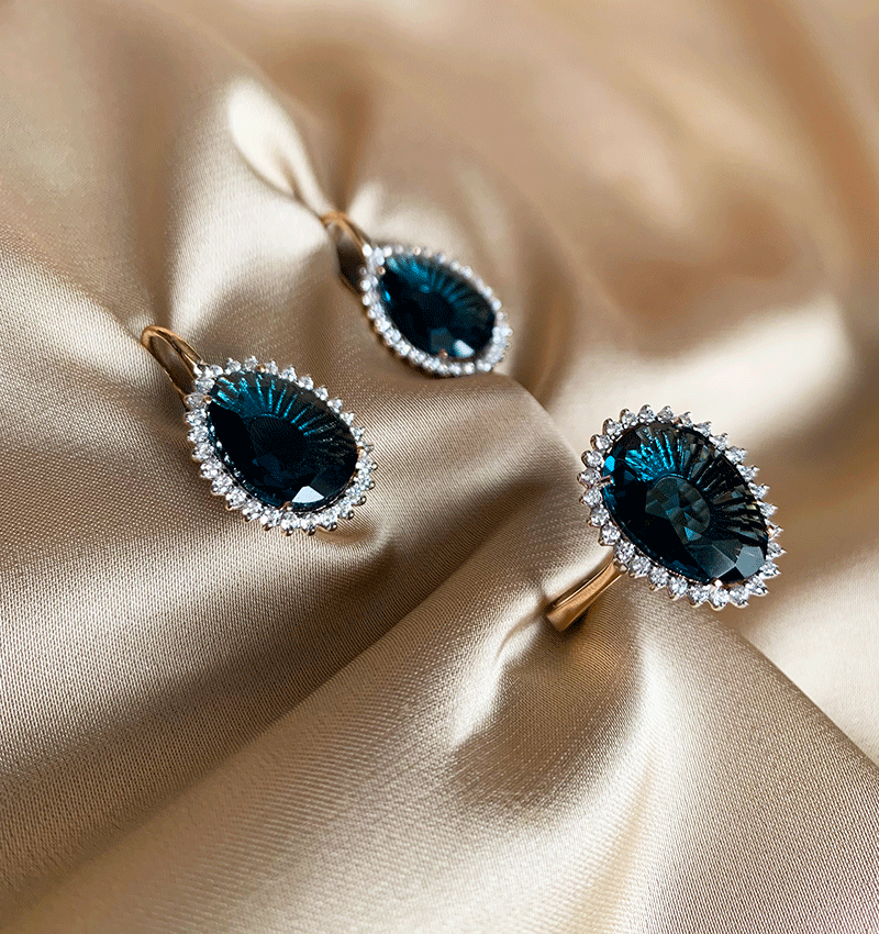 Rose gold set with zircon and topaz