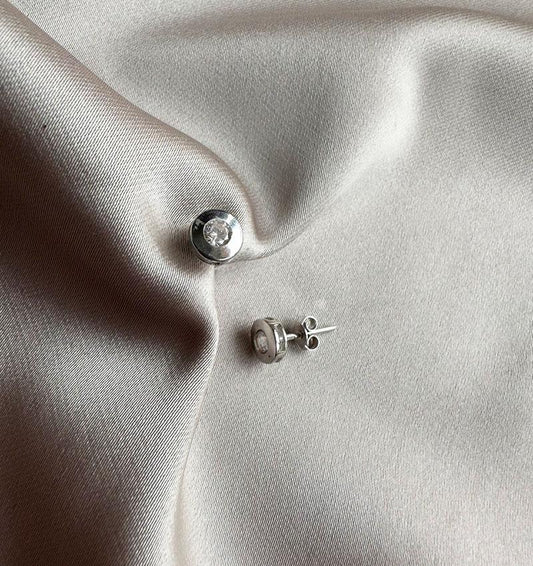 White gold earrings with zircon