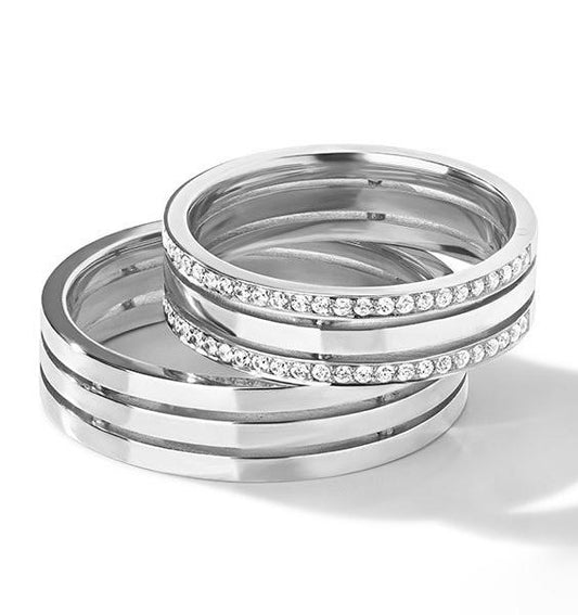 Wedding rings in white, rose, and yellow gold with cubic zirconia