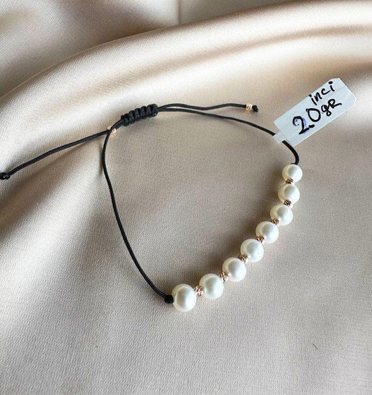 Rose gold bracelet with pearls