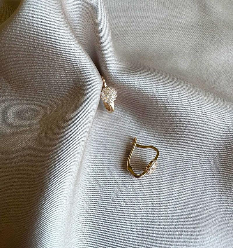 Rose gold earrings with zircon