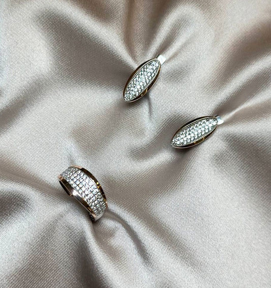 Set of silver with gold inserts and zircon