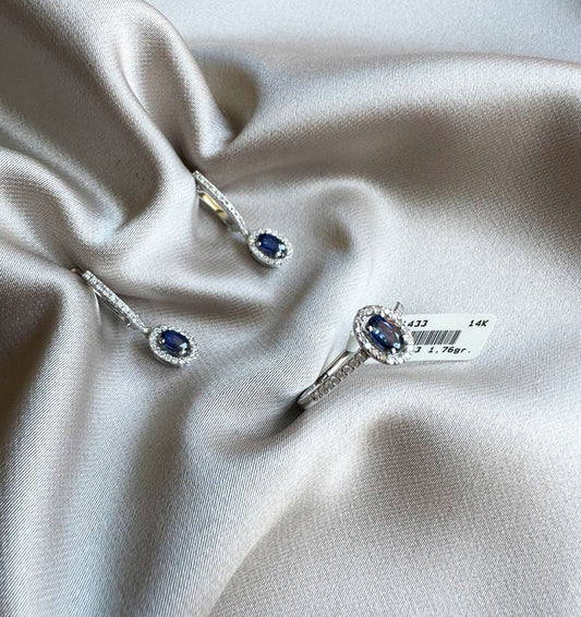 Aur alb încrustat cu un diamant și un safir de 1,42 carate