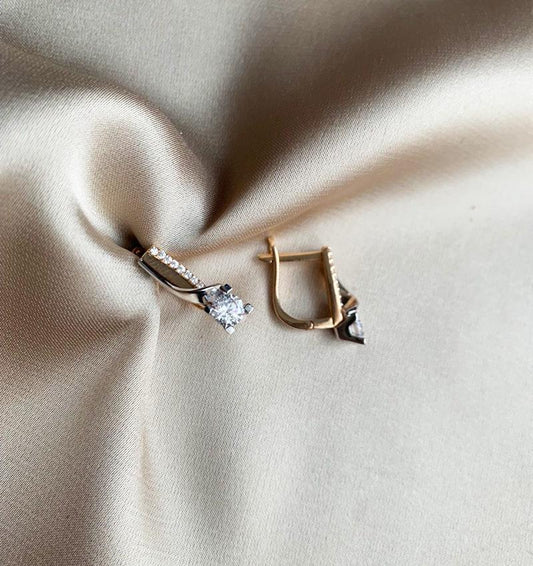 Rose gold earrings with zircon